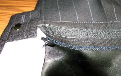 Обработка верхнего среза брюк поясом на корсажной ленте